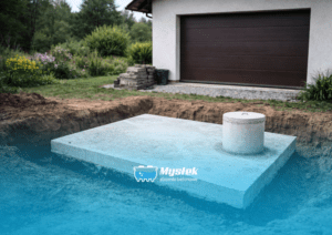 Szambo betonowe 10m3 z płytą najazdową – trwałe rozwiązanie pod podjazd i parking